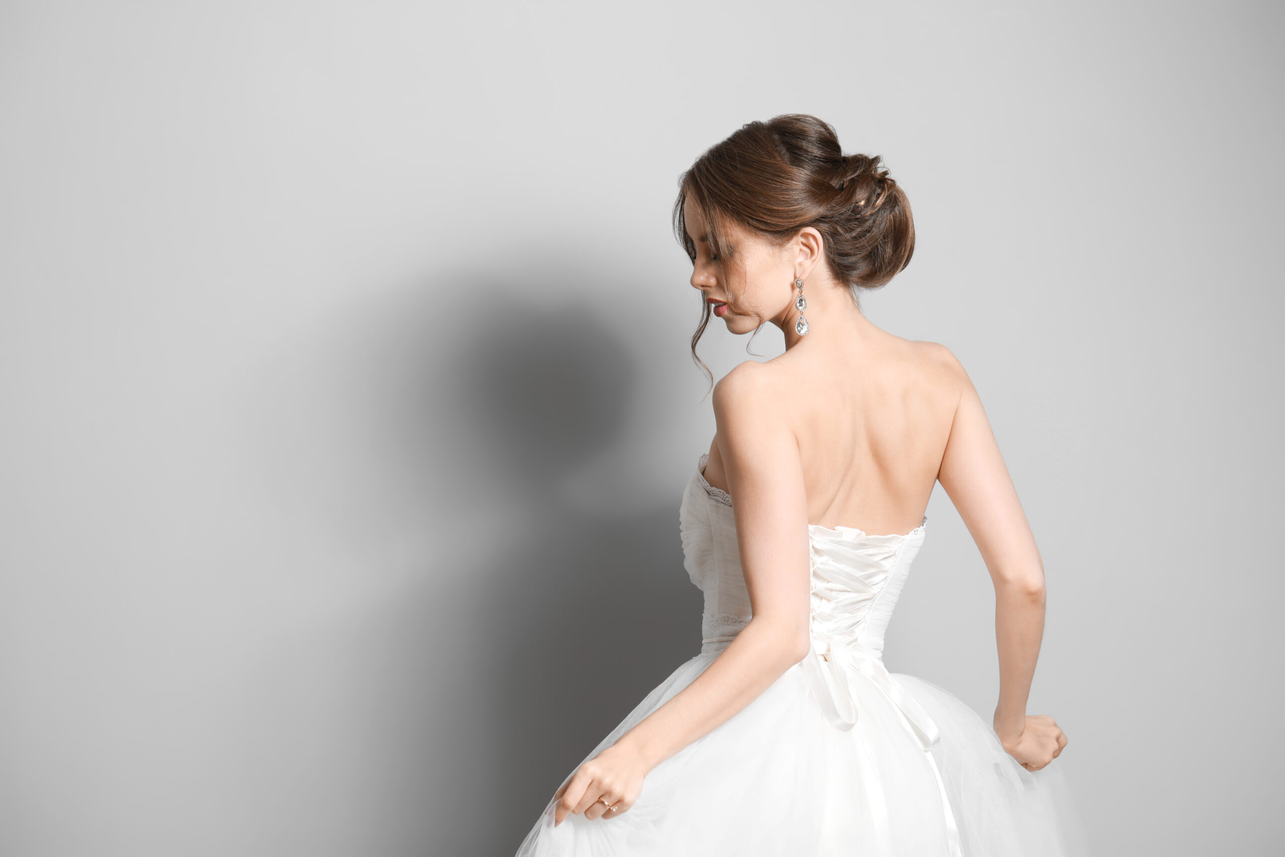 Beautiful,Young,Bride,On,Grey,Background