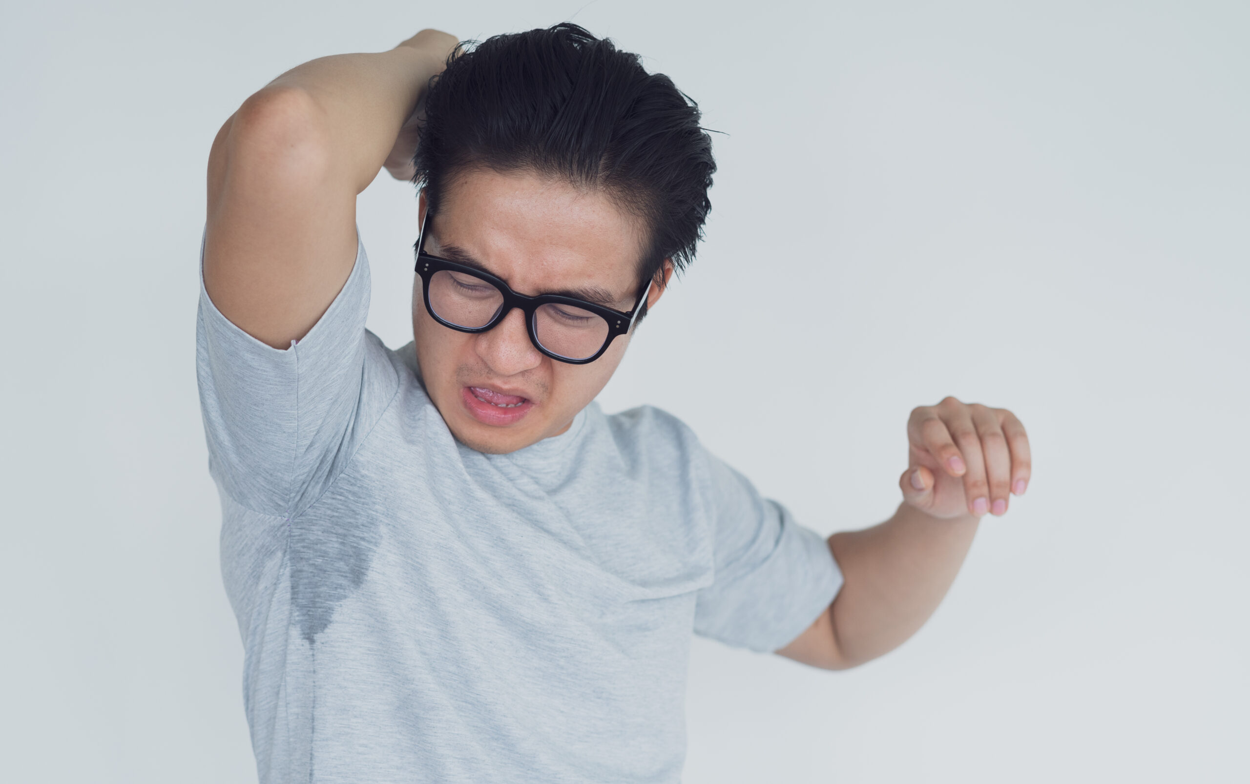Photo,Of,Asian,Man,With,Underarm,Odor