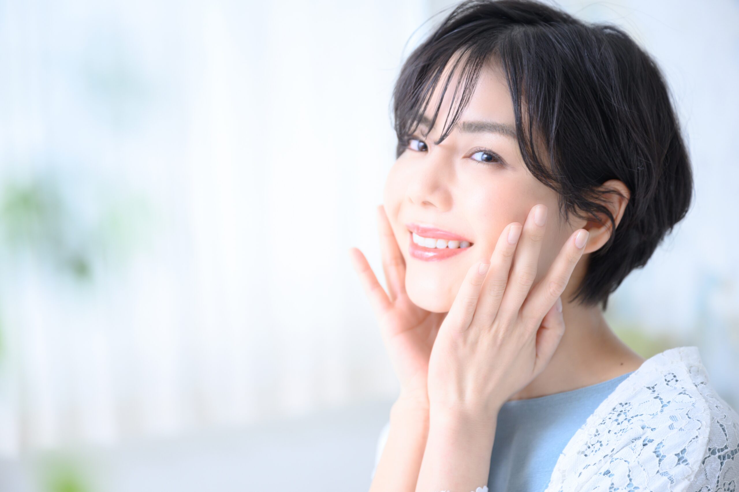 Beautiful,Japanese,Woman,With,Hand,On,Face,And,Smile,,Easy